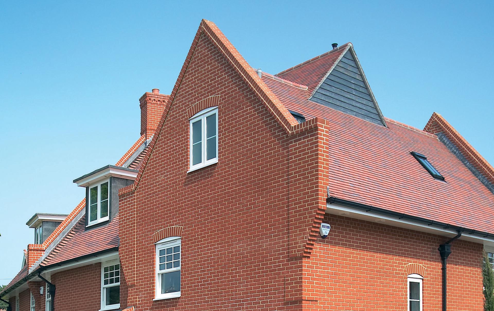 Baillie Park with Red Blue smooth roof tiles